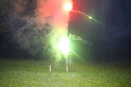The launching of backyard fireworks