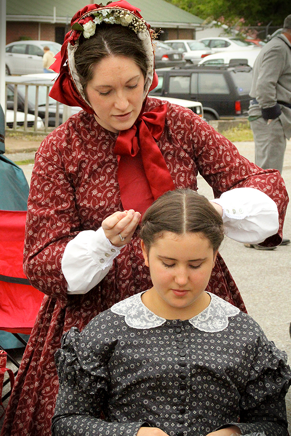 Melissa helps Mary with an 1860s do