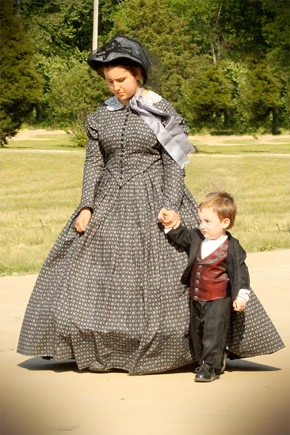 Mrs. Carrie McGavock (Aunt Mary) and Calvin take a stroll at the end of the day